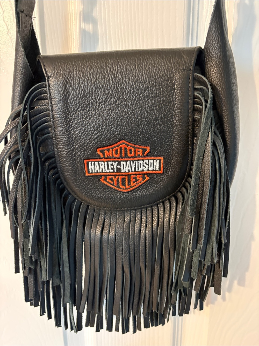 Harley-Davidson Black Crossbody with Fringe and Orange Logo